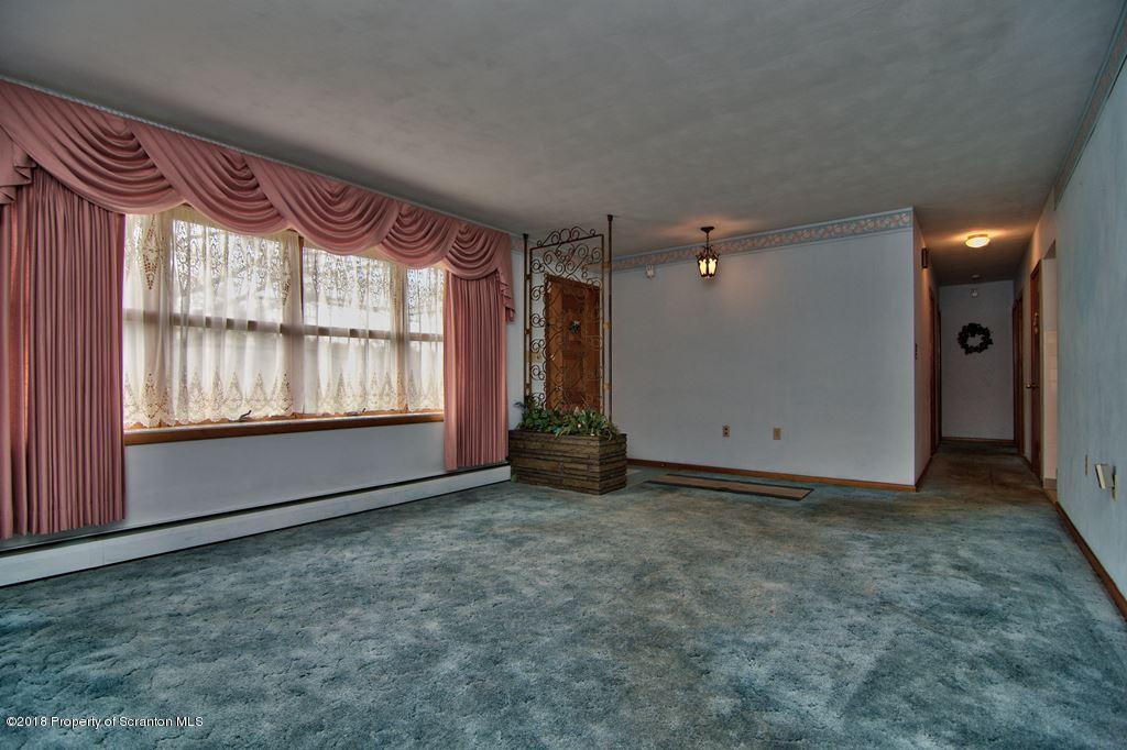 1073 Mt Cobb Road Lake Ariel, PA 18436 - Photo 3 of 22 an empty room with windows and closet