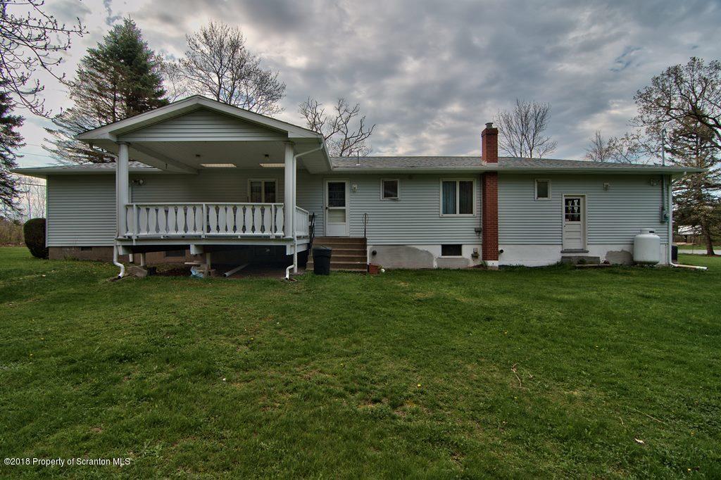 1073 Mt Cobb Road Lake Ariel, PA 18436 - Photo 7 of 22 a view of a house with a yard