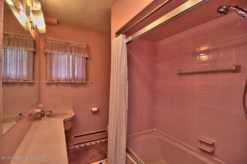 1073 Mt Cobb Road Lake Ariel, PA 18436 - Photo 10 of 22 a bathroom with a sink and a shower