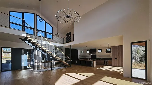 a view of entryway livingroom and hall