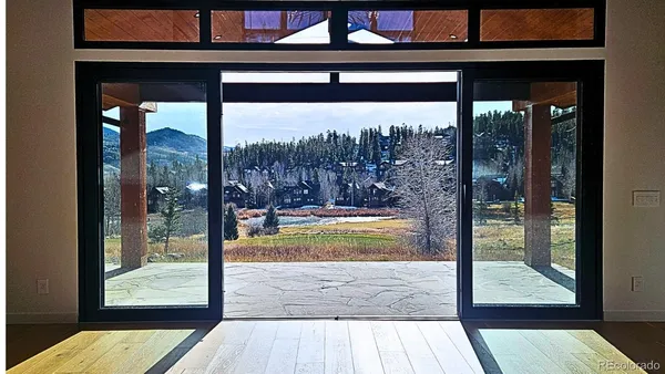 a view of a glass door with a from a balcony