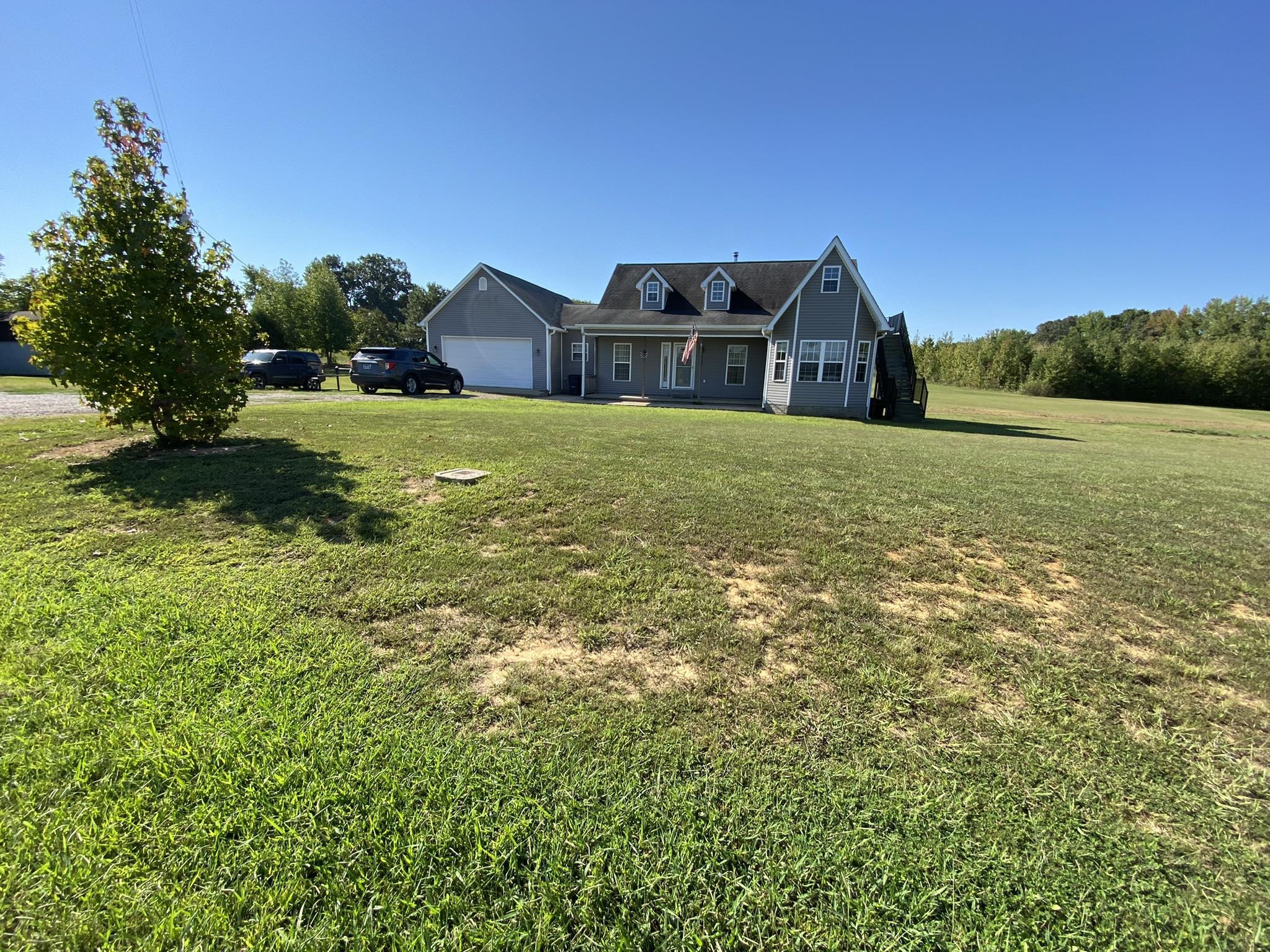 124 Milan Road Finger, TN 38334 - Photo 1 of 32 a house view with a outdoor space