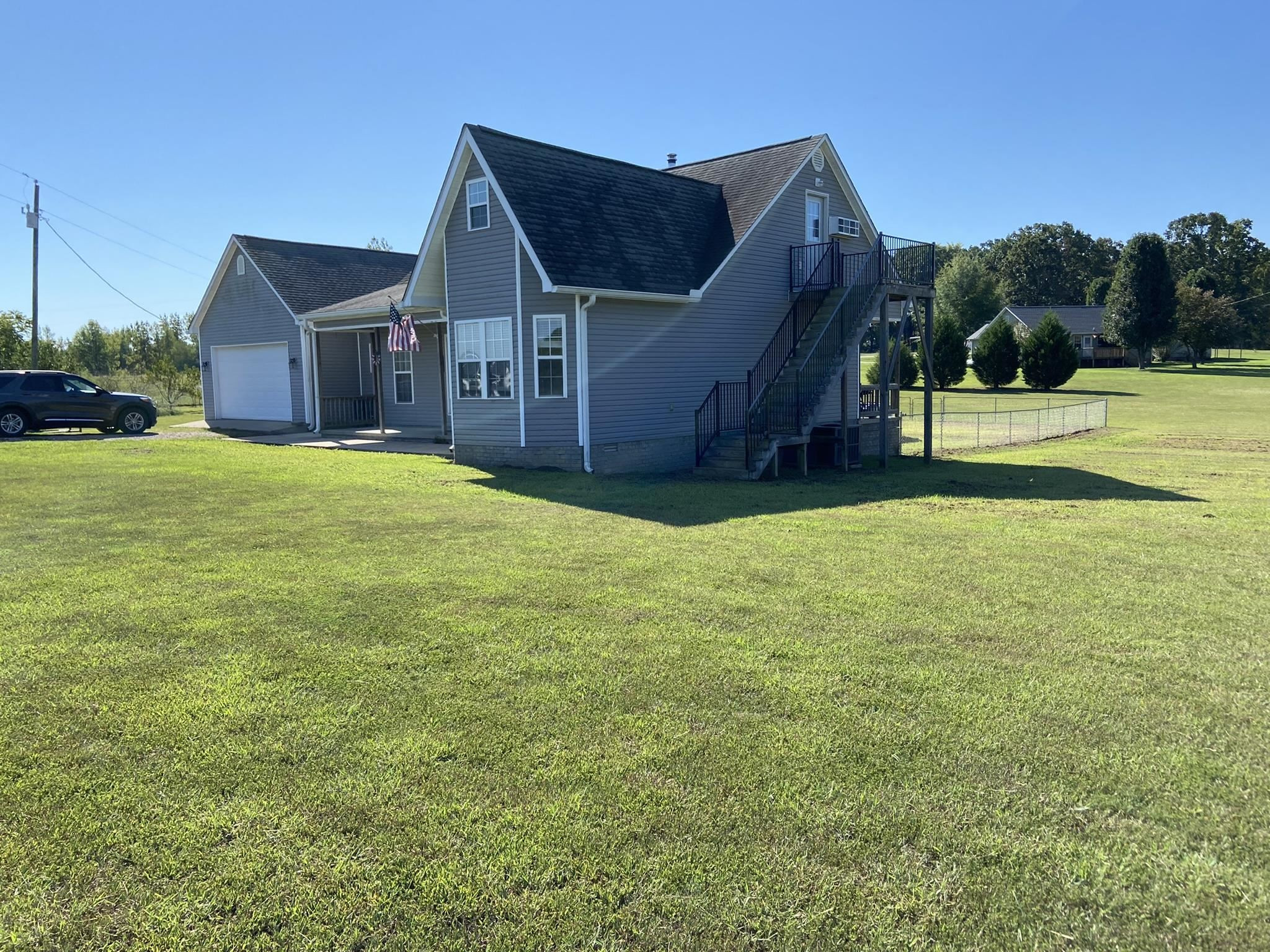 124 Milan Road Finger, TN 38334 - Photo 32 of 32 a house view with a garden space