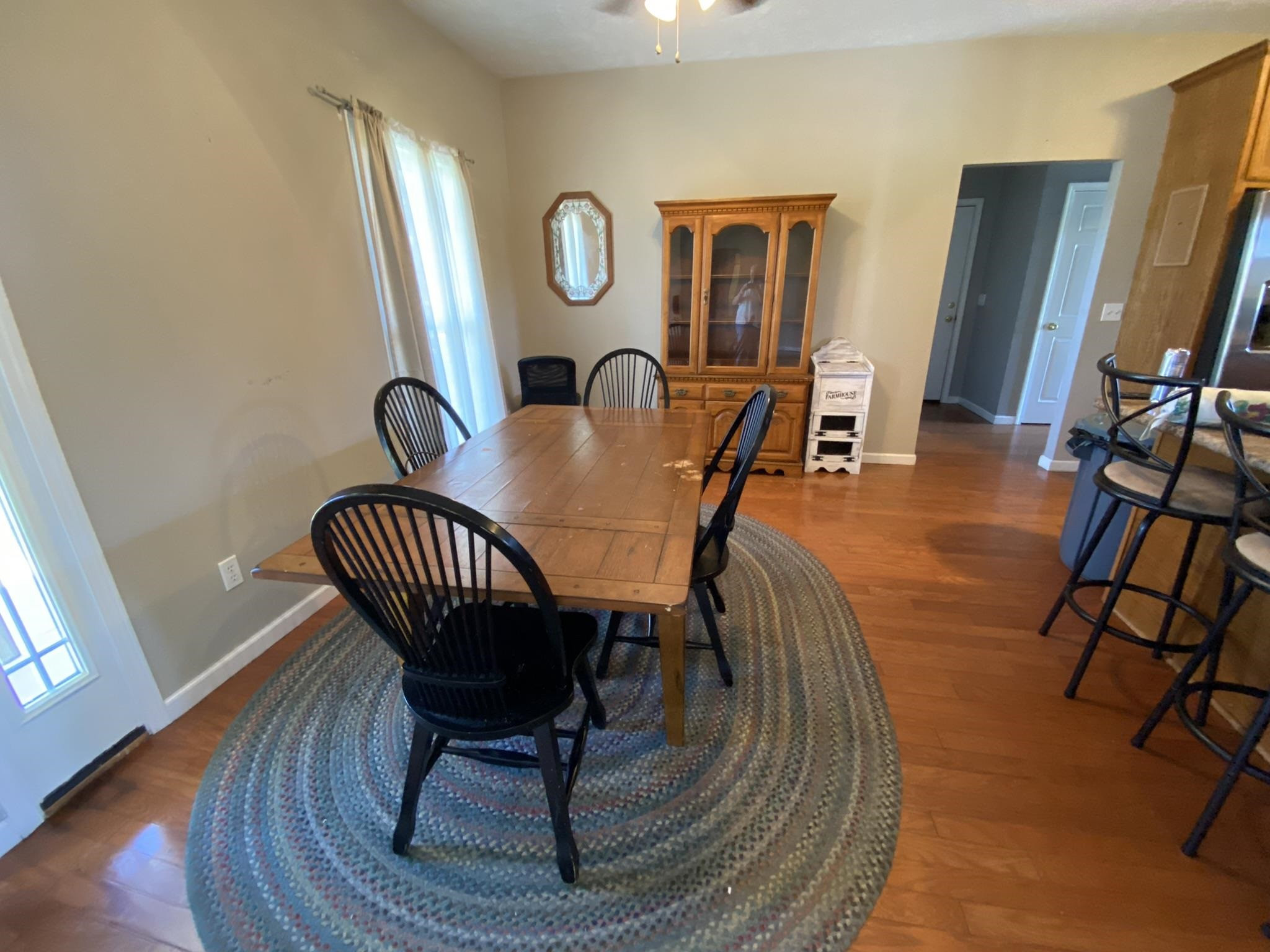 124 Milan Road Finger, TN 38334 - Photo 6 of 32 a dining room with furniture a rug and wooden floor