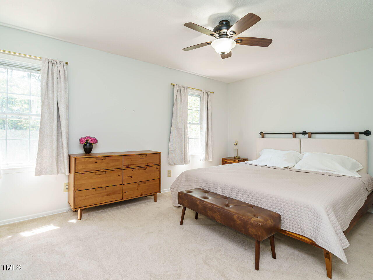 3125 Morningside Drive Raleigh, NC 27607 - Photo 15 of 26 a bedroom with a bed dresser and a window