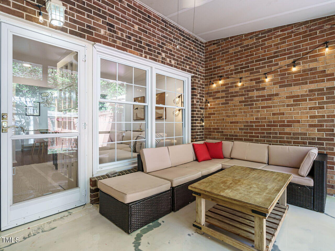3125 Morningside Drive Raleigh, NC 27607 - Photo 22 of 26 a living room with furniture and a potted plant