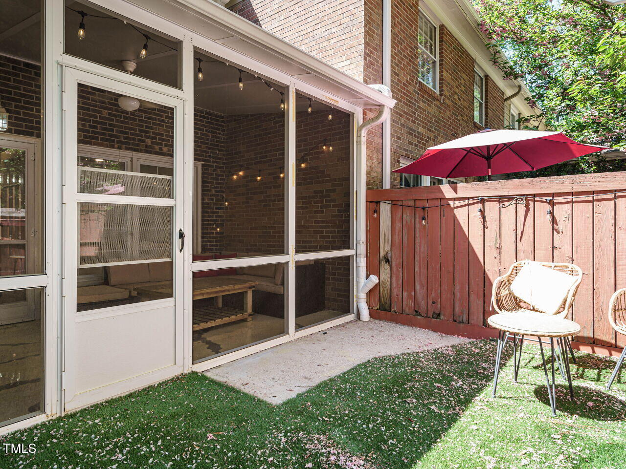 3125 Morningside Drive Raleigh, NC 27607 - Photo 24 of 26 a view of a chair and table in backyard of the house