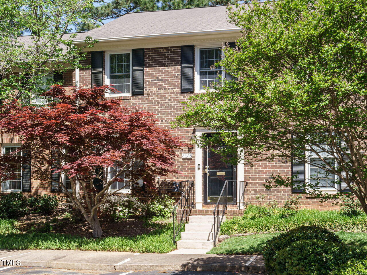 3125 Morningside Drive Raleigh, NC 27607 - Photo 2 of 26 a front view of a house with garden