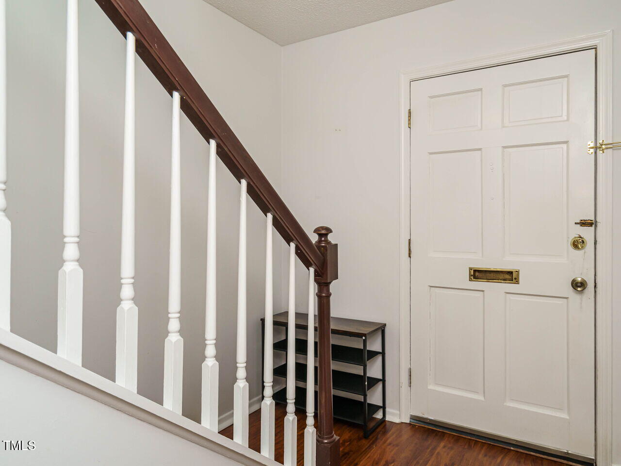 3125 Morningside Drive Raleigh, NC 27607 - Photo 4 of 26 a view of staircase with wooden floor and staircase