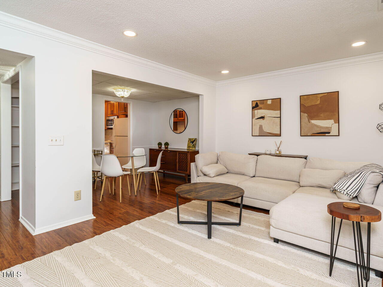 3125 Morningside Drive Raleigh, NC 27607 - Photo 8 of 26 a living room with furniture and a wooden floor