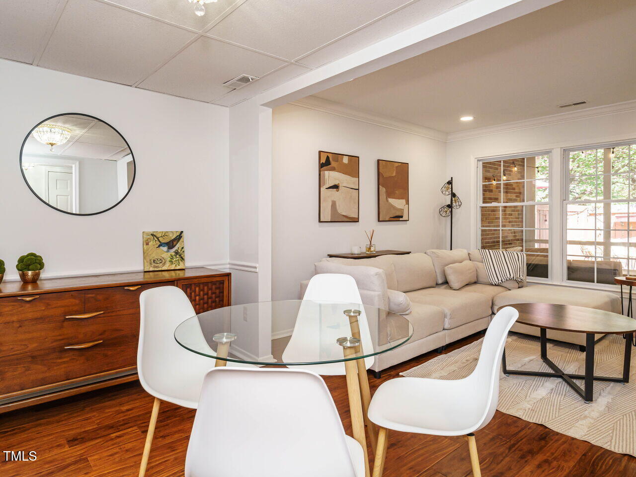 3125 Morningside Drive Raleigh, NC 27607 - Photo 9 of 26 a living room with furniture and a large window