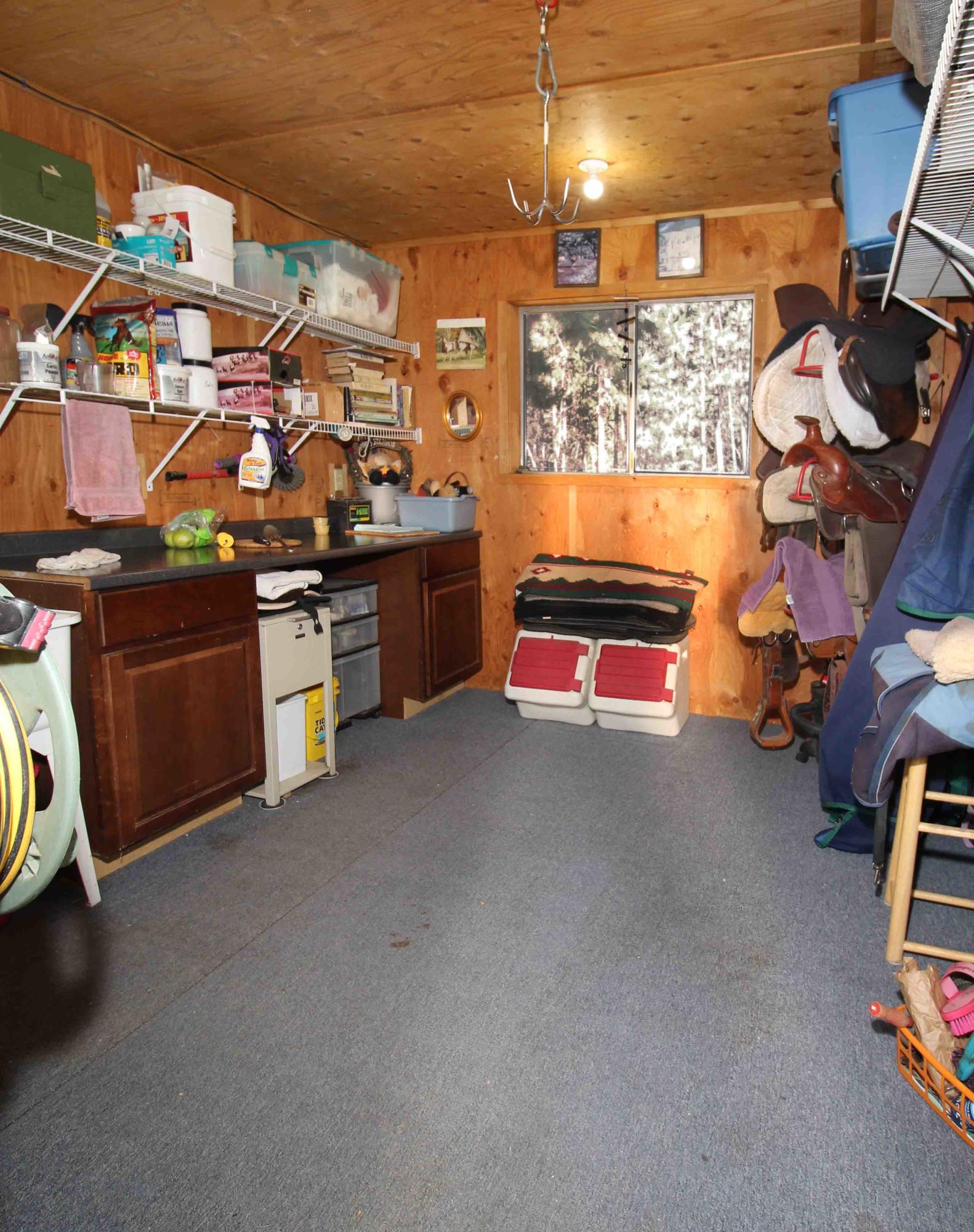60076 Turquoise Road Bend, OR 97702 - Photo 5 of 43 Insulated tack room with hot water, sink & saddle rack