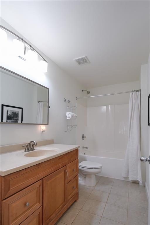 4330 Farmbrook Lane Cumming, GA 30041 - Photo 39 of 46 a spacious bathroom with a granite countertop sink a toilet and a shower