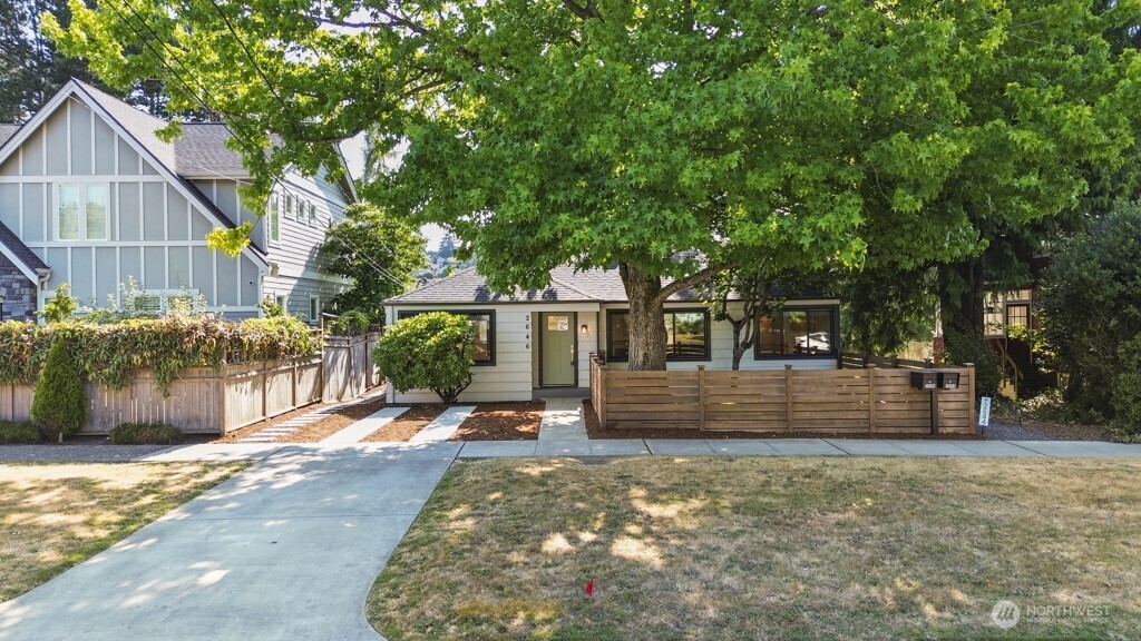 2646 34th Avenue West Seattle, WA 98199 - Photo 3 of 40 a view of a house with a yard