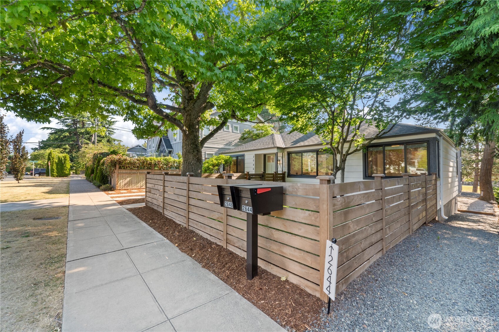2646 34th Avenue West Seattle, WA 98199 - Photo 40 of 40 a view of a house with backyard and a tree