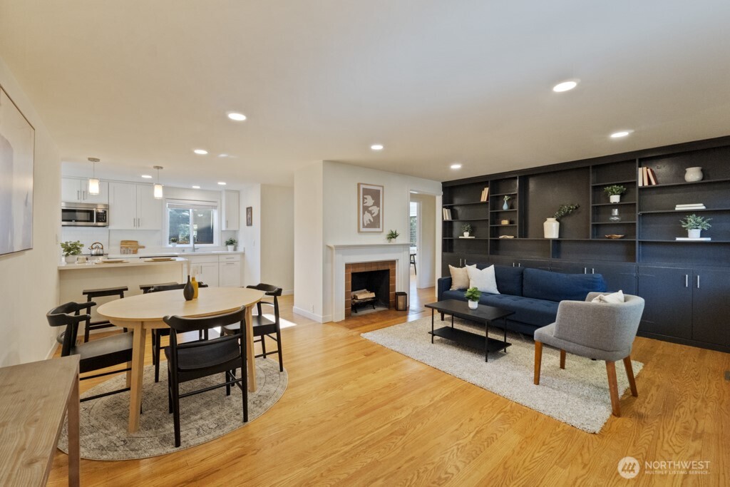 2646 34th Avenue West Seattle, WA 98199 - Photo 6 of 40 a living room with furniture and a fireplace