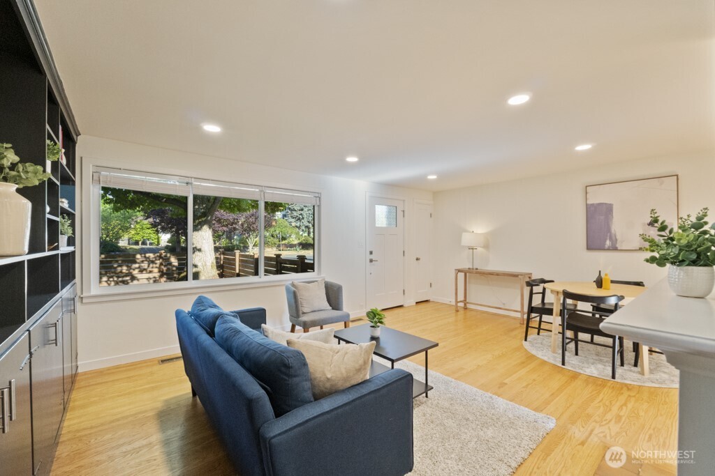 2646 34th Avenue West Seattle, WA 98199 - Photo 8 of 40 a living room with furniture and a large window