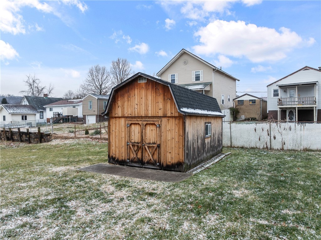 1011 Parriott Avenue Moundsville, WV 26041 - Photo 35 of 44 View of shed with a fenced backyard and a residential view