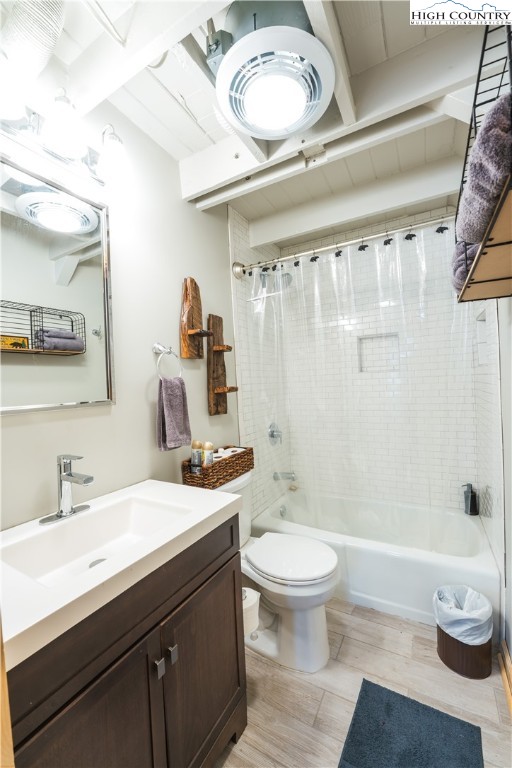 902 Pine Ridge Road Beech Mountain, NC 28604 - Photo 15 of 24 a bathroom with a sink toilet a mirror and shower