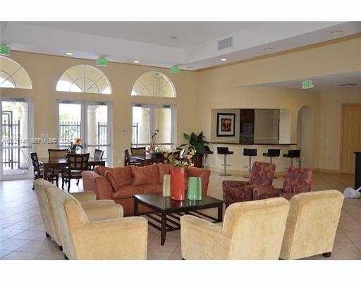 5930 Abbey Road Tamarac, FL 33321 - Photo 26 of 26 a living room with furniture and a large window