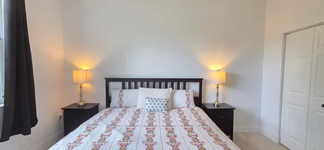 a bathroom with a toilet a sink and a mirror