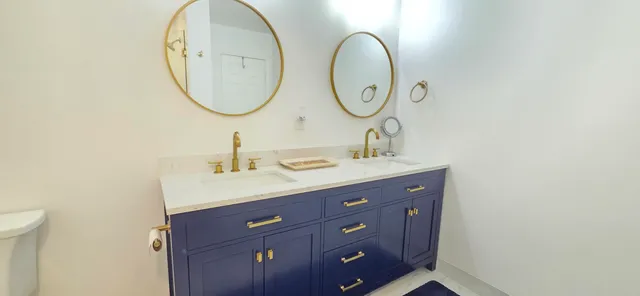 a bedroom with bed and a window