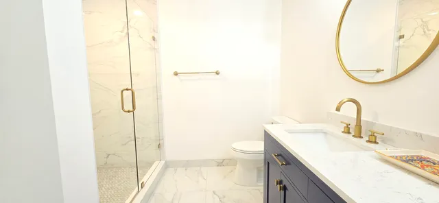 a view of a dining room with furniture wooden floor and chandelier