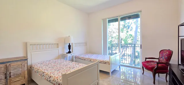 a kitchen with a sink cabinets and appliances