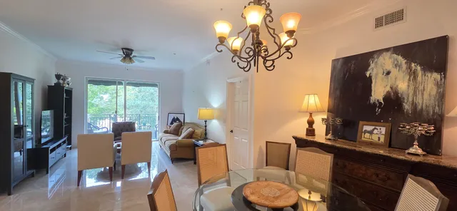 a kitchen with a sink cabinets and window