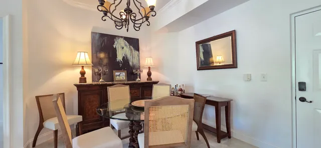 a kitchen with cabinets and white appliances