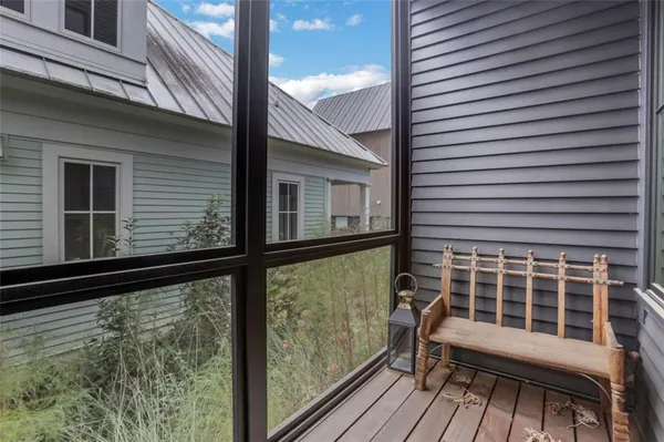 a view of a balcony with chair