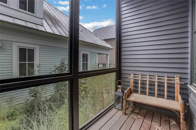 a view of a balcony with chair
