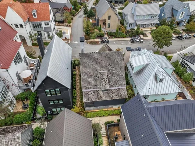 an aerial view of a house with outdoor space