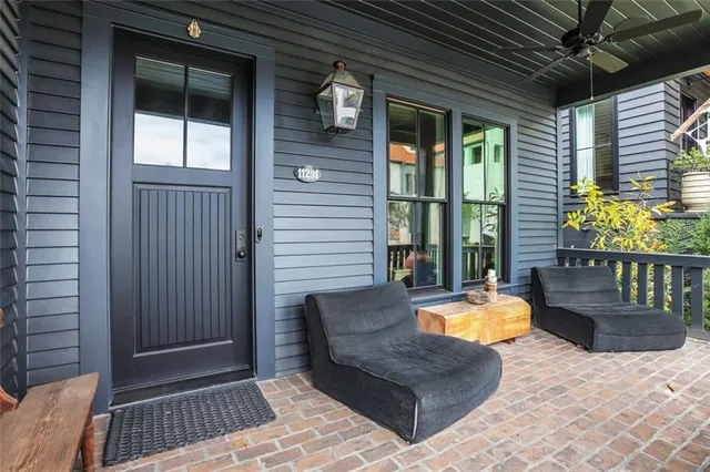 a view of swimming pool with outdoor seating
