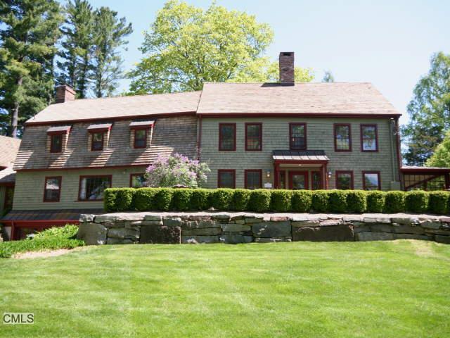 197 Farmingville Road Ridgefield, CT 06877 - Photo 1 of 1 a front view of house with yard and green space