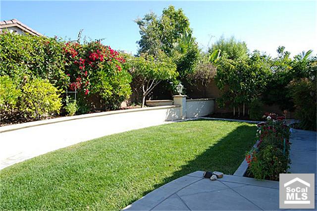 16 Riveroaks Irvine, CA 92602 - Photo 8 of 8 a view of yard with fountain in front of it