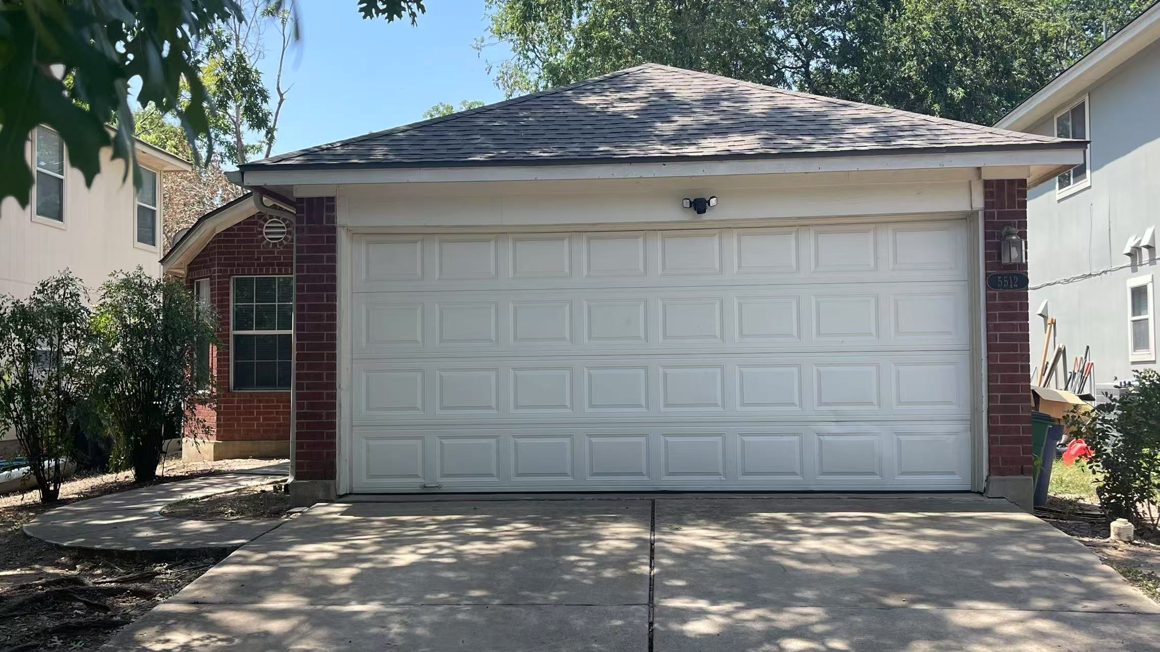 5512 Steven Creek Way Austin, TX 78721 - Photo 1 of 30 View of garage