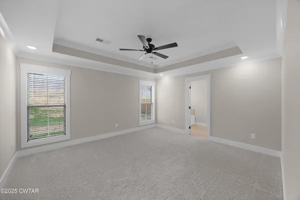 a view of storage and utility room with racks on the wall