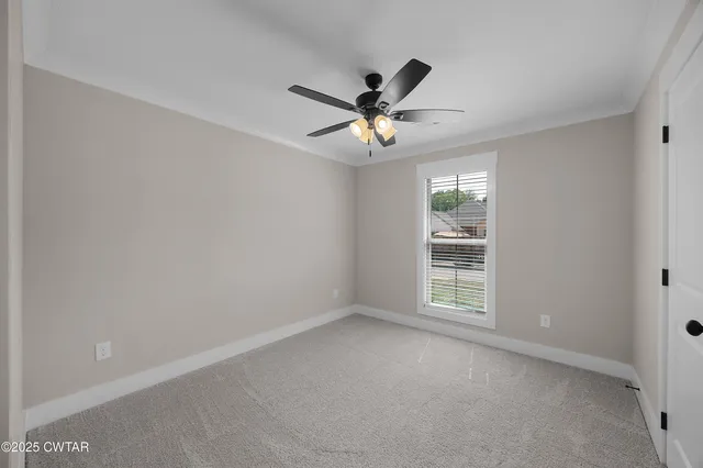 a bathroom with a double vanity sink a mirror and a bathtub