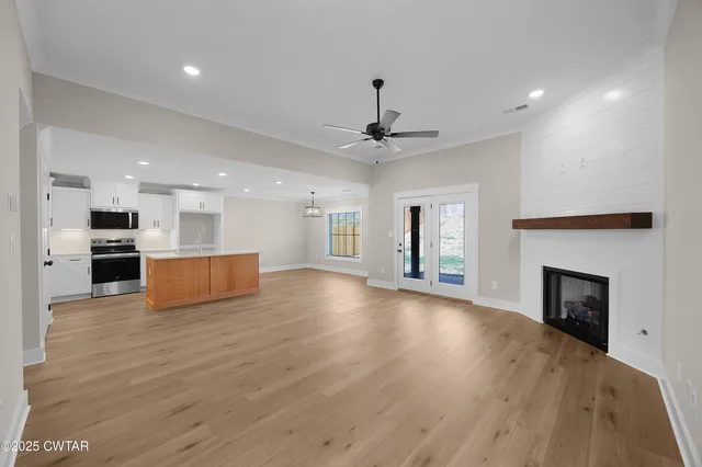 a picture of a book and a white bed