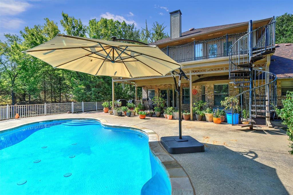 297 Cemetery Road Pottsboro, TX 75076 - Photo 26 of 40 View of swimming pool with a patio