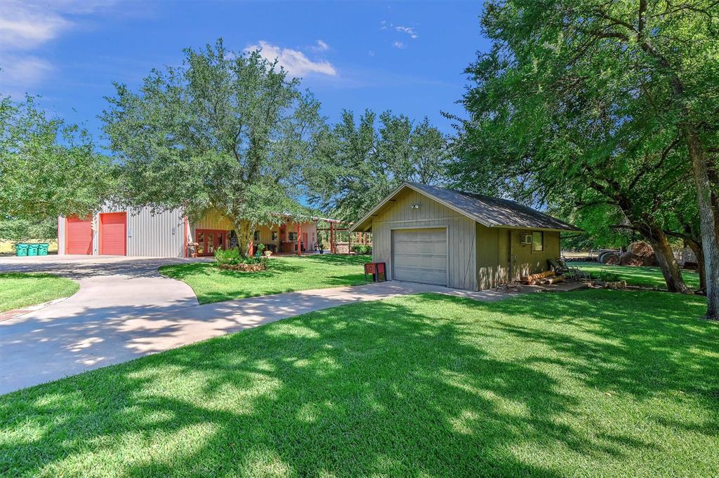 297 Cemetery Road Pottsboro, TX 75076 - Photo 29 of 40 2nd Building; 1 Car Garage/workshop with AC