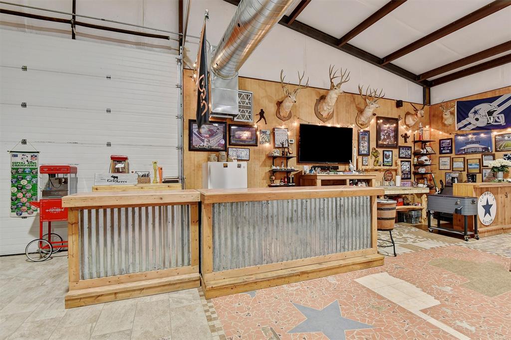 297 Cemetery Road Pottsboro, TX 75076 - Photo 32 of 40 Bar area in Party Barn