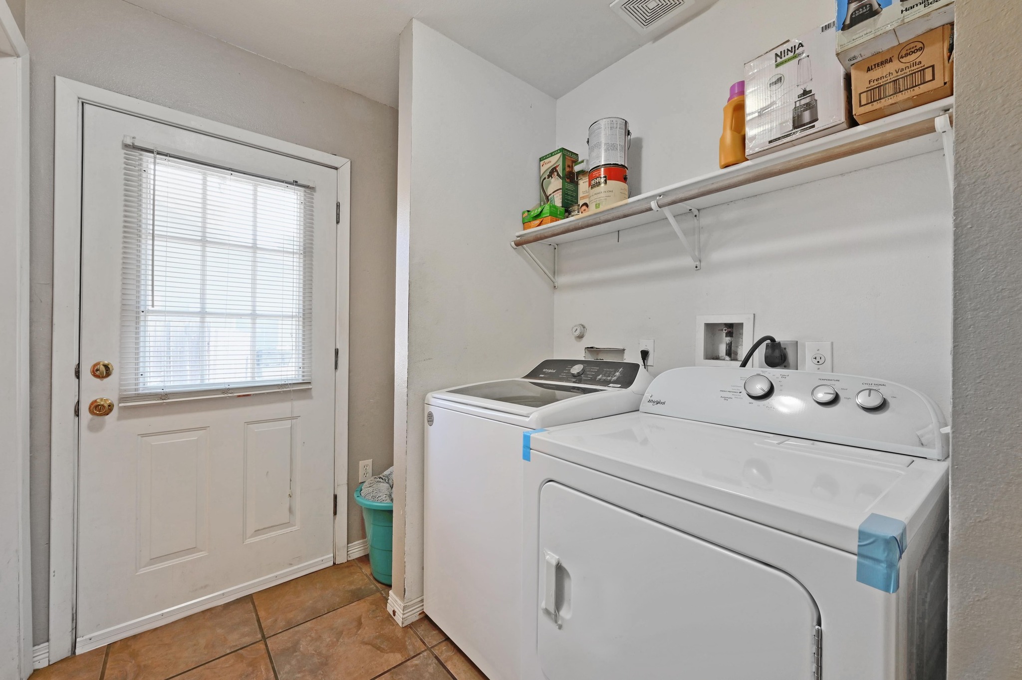 6901 Frontera Trail Austin, TX 78741 - Photo 17 of 21 a utility room with dryer and washer