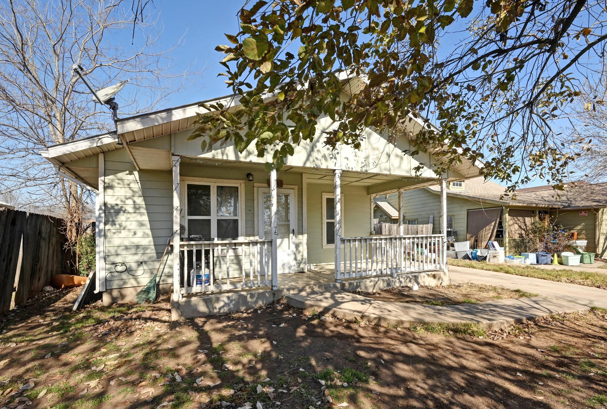6901 Frontera Trail Austin, TX 78741 - Photo 2 of 21 a front view of a house with a patio