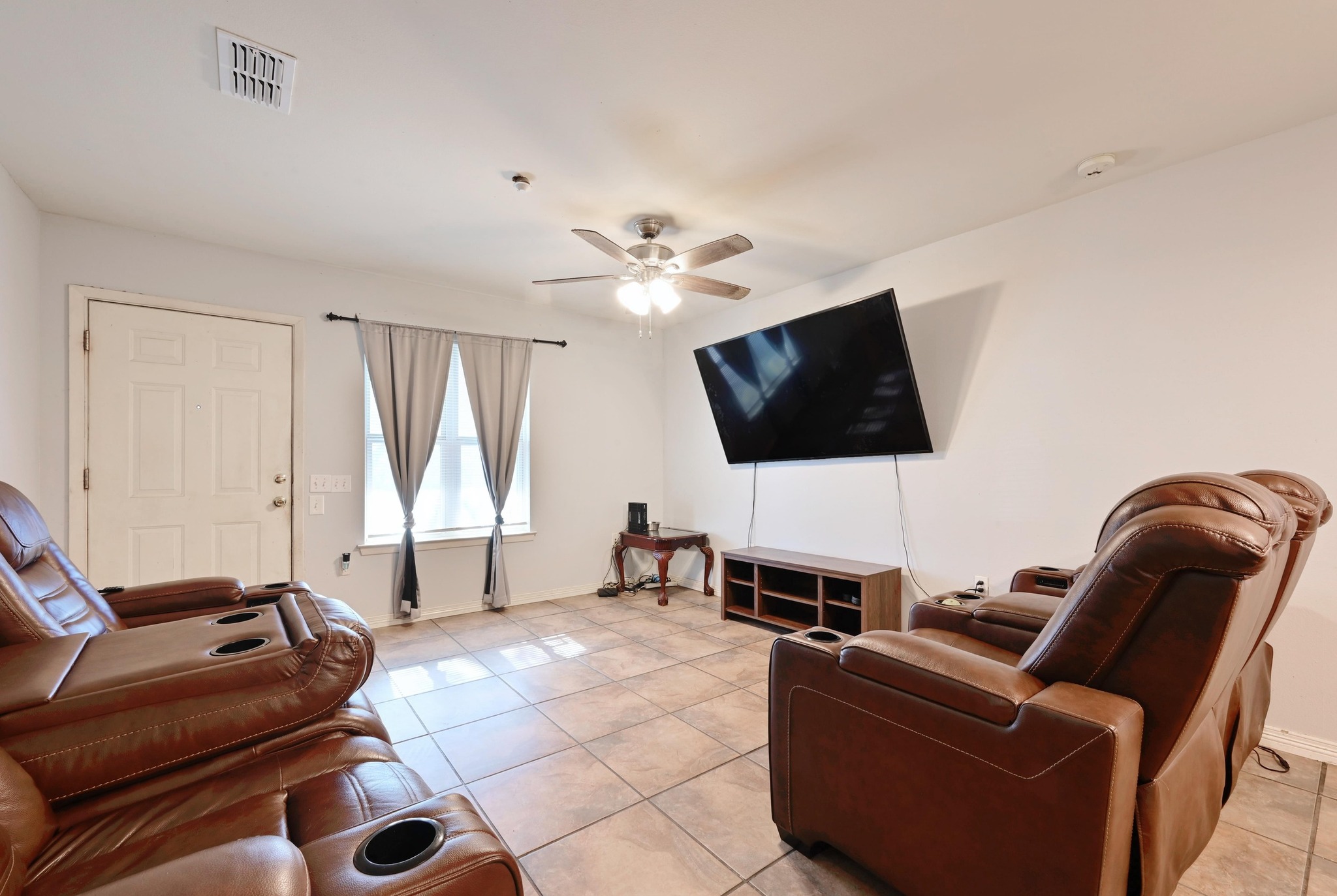 6901 Frontera Trail Austin, TX 78741 - Photo 6 of 21 a living room with furniture and a flat screen tv