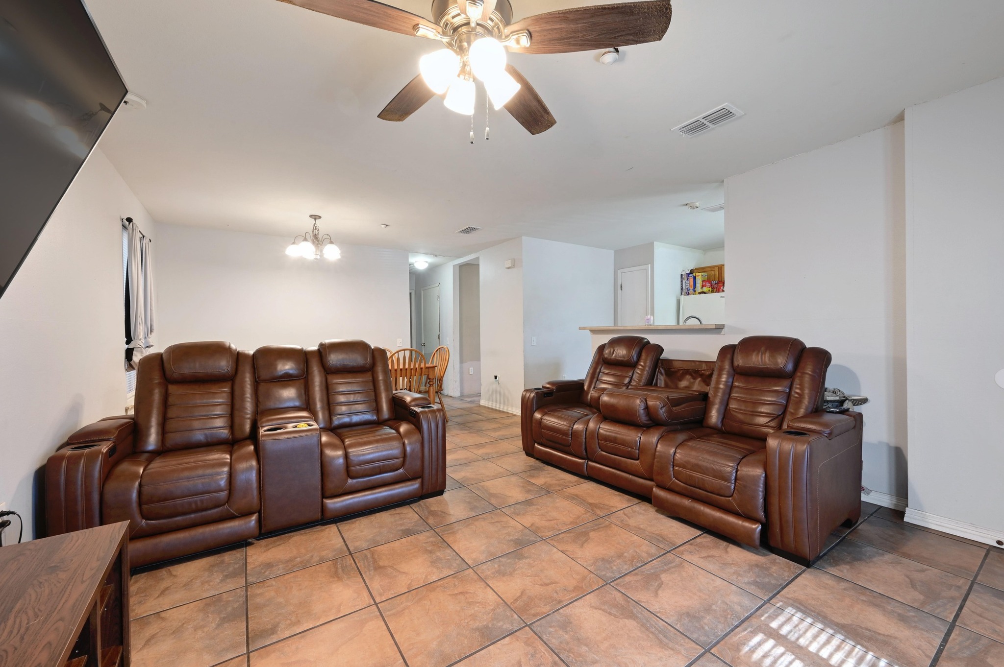 6901 Frontera Trail Austin, TX 78741 - Photo 8 of 21 a living room with couches and kitchen view
