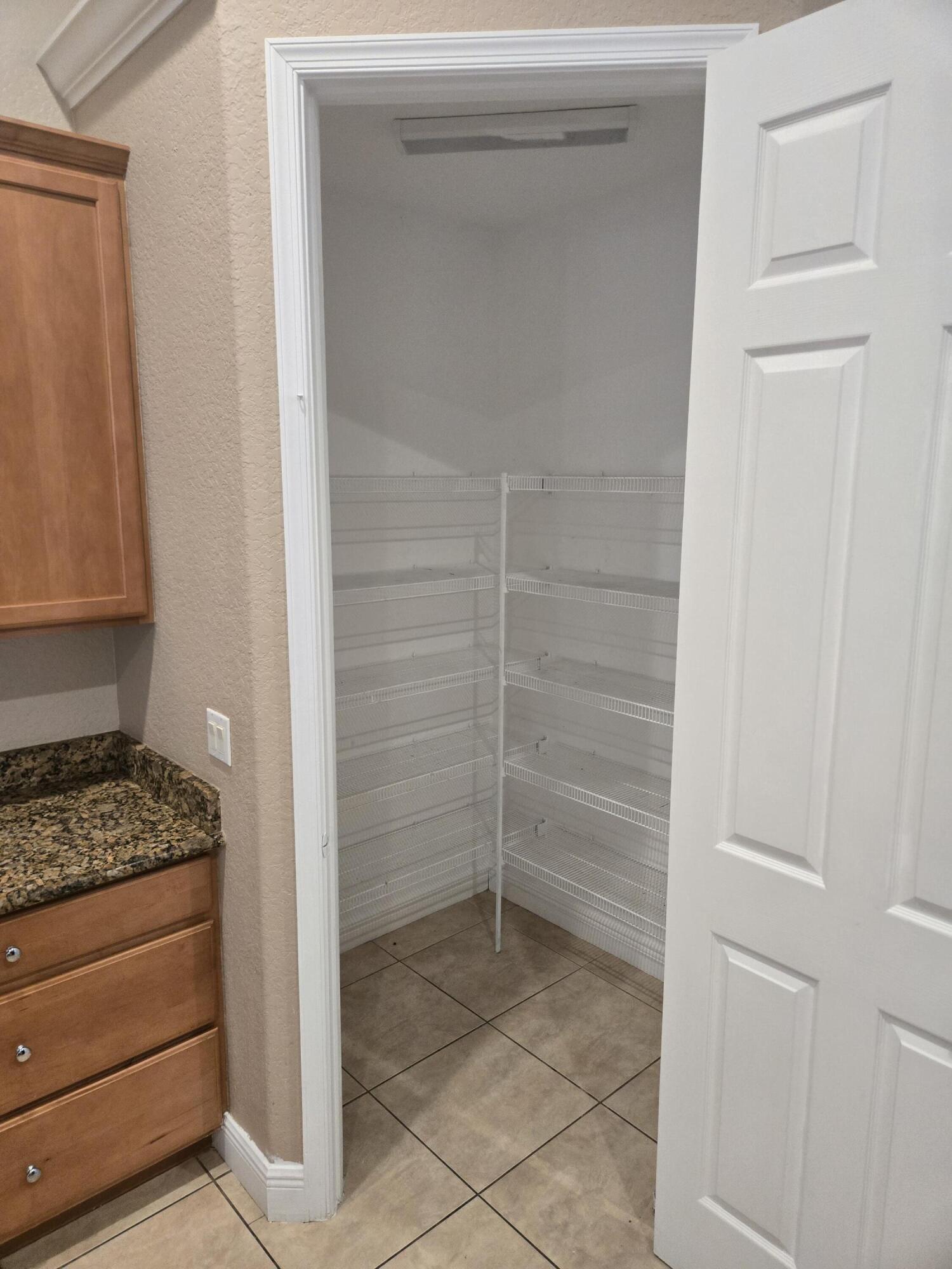 2472 Southwest Valnera Street Port St. Lucie, FL 34953 - Photo 24 of 38 Walk in Pantry