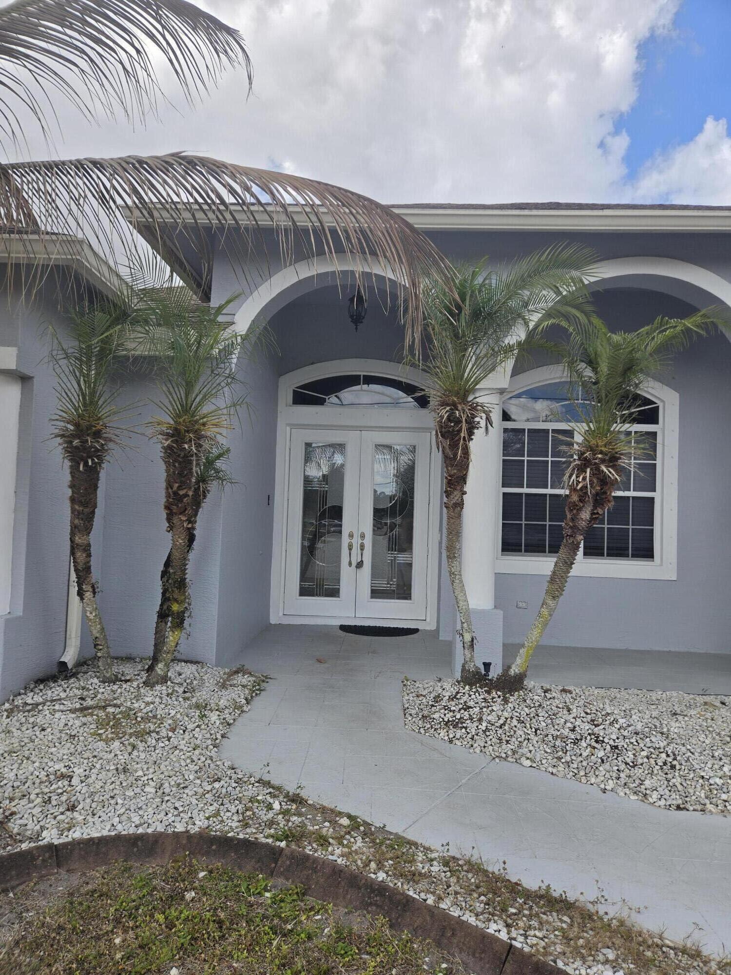 2472 Southwest Valnera Street Port St. Lucie, FL 34953 - Photo 5 of 38 Hello, welcome in!