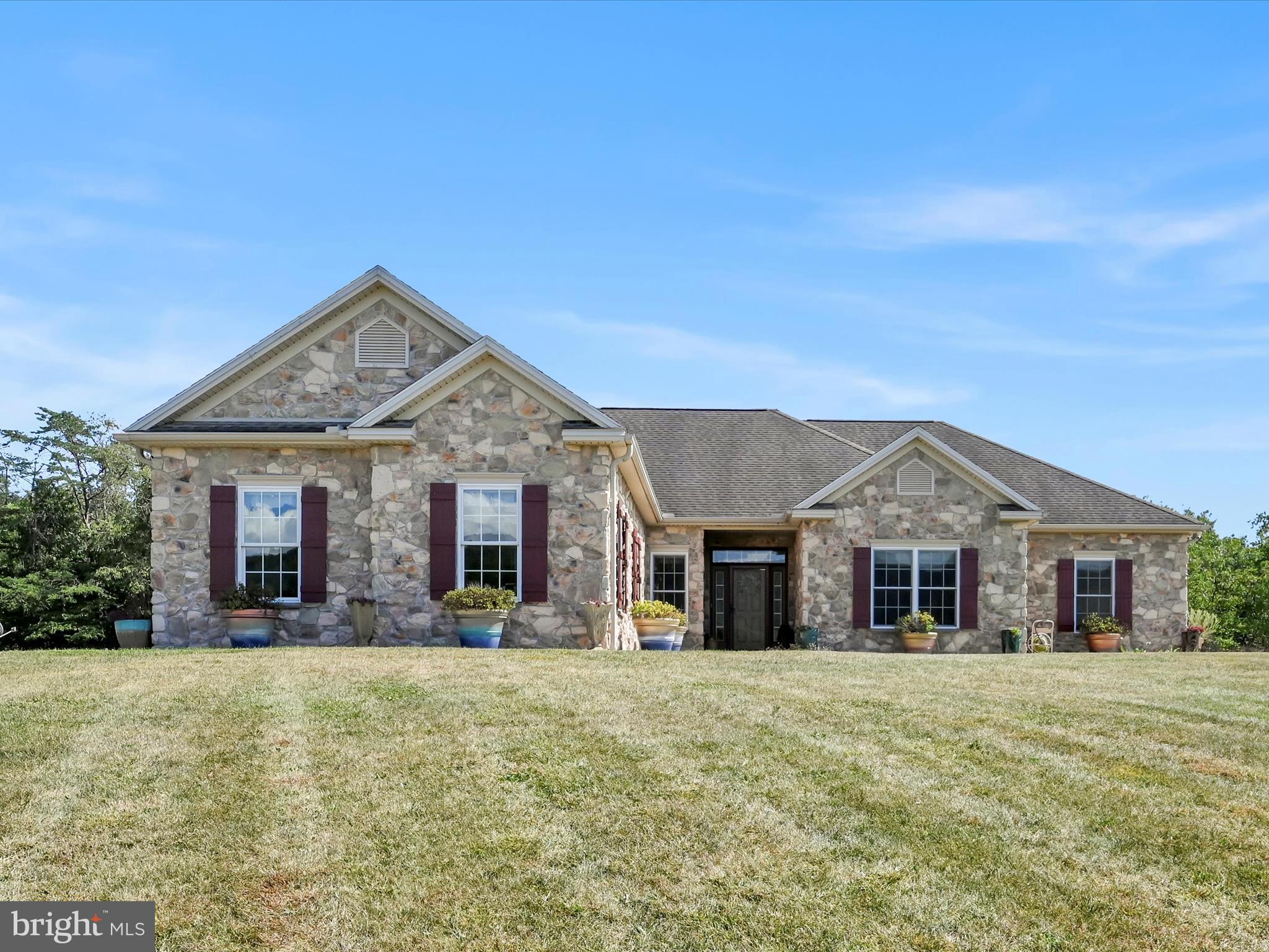 1120 Suedberg Road Pine Grove, PA 17963 - Photo 1 of 75 a front view of a house with a porch